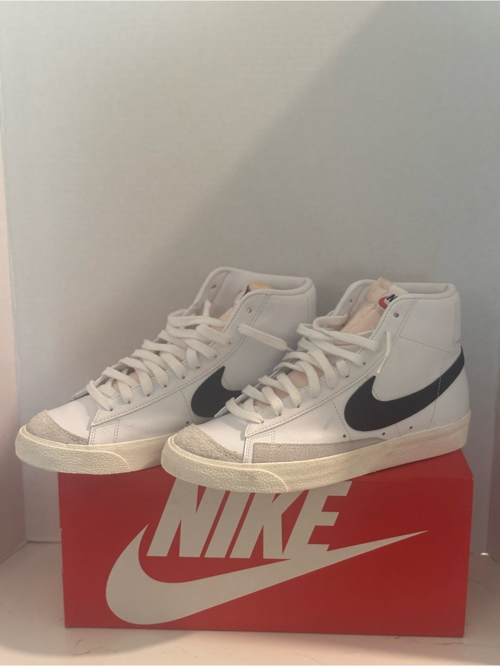 Nike Men’s White High-Top Sneakers with Black Swoosh Nike Blazer